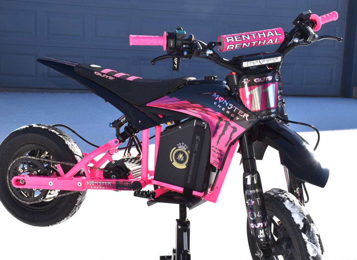 Ripped Monster graphics kit installed on a pink mini bike, side view
