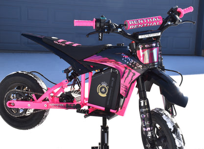 Ripped Monster graphics kit installed on a pink mini bike, side view