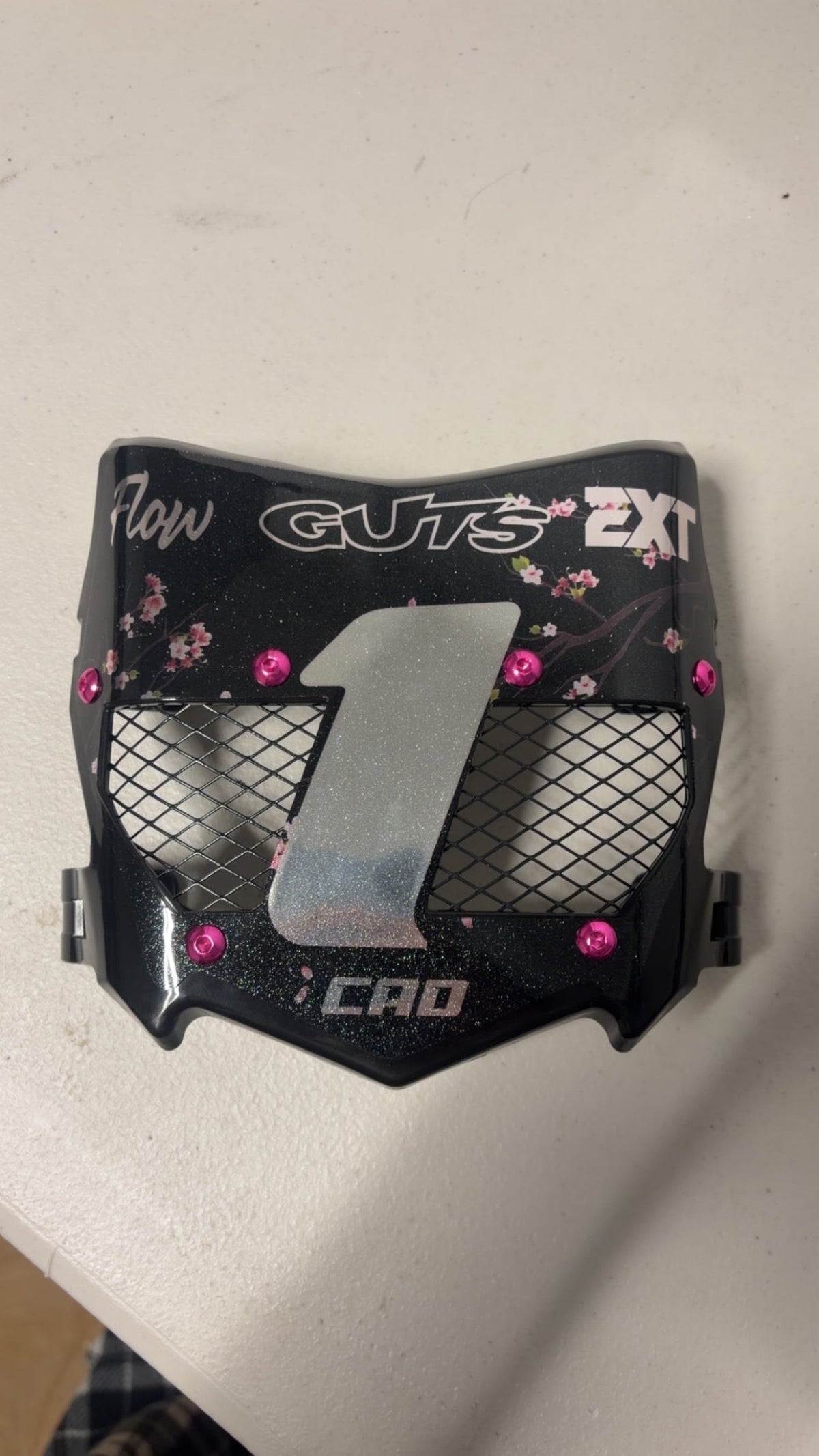 Pink blossom titanium vented number plate
